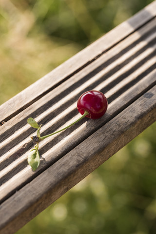 Cherry on wood stock photo