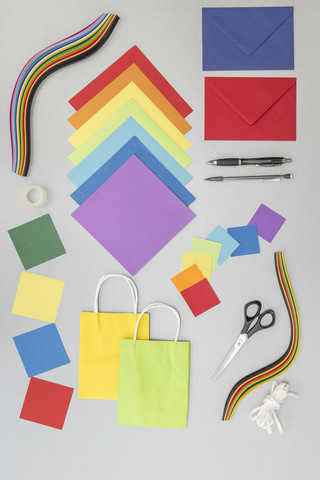 Tools and colourful paper for craft projects stock photo