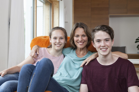 Portrait of happy family at home stock photo