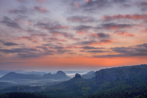 Germany, Saxon Switzerland National Park, view to Winterstein Mountain at sunrise stock photo