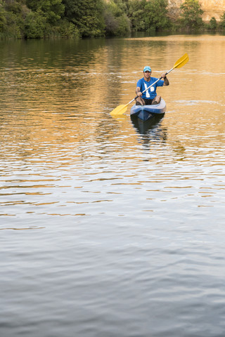 Spain, Segovia, Man in a canoe in Las Hoces del Rio Duraton stock photo