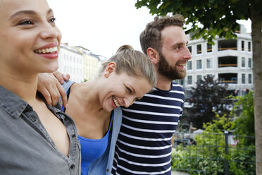 Three happy friends outdoors - WESTF021751