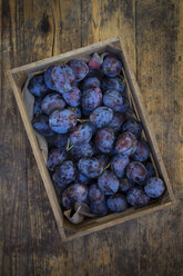 Wooden box of plums - LVF05288