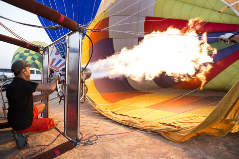 Hot air ballon is being prepared stock photo