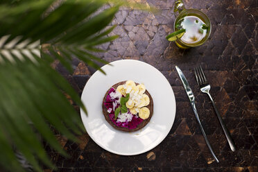 Plate of glutenfree pancakes with dragonfruit and banana slices - KNTF00499