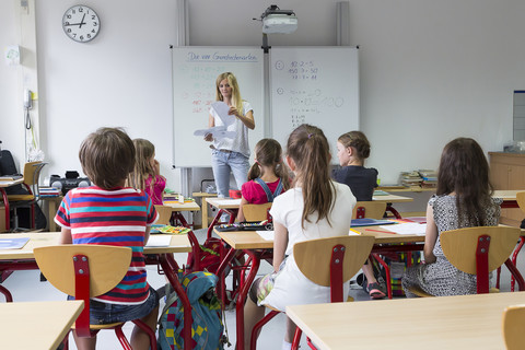 Teacher with her class stock photo