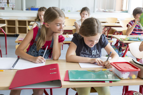 Schoolgirls at class stock photo