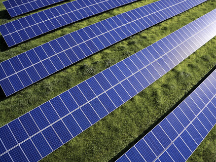 USA, North Carolina, Extreme low-level aerial photograph of solar panels in a solar farm - BCDF00084