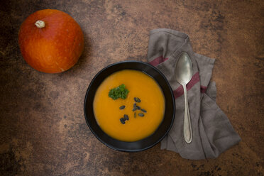 Organic pumpkin soup in black bowl - LVF05357