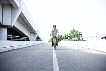 Teenage boy riding bicycle - FSF00551