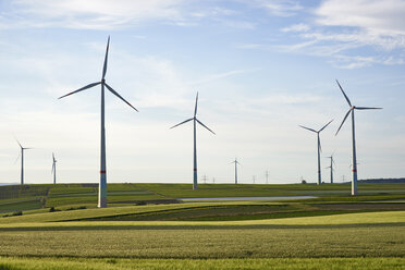 Germany, Rhineland-Palatinate, Woerrstadt, wind farm and fields - BSCF00540