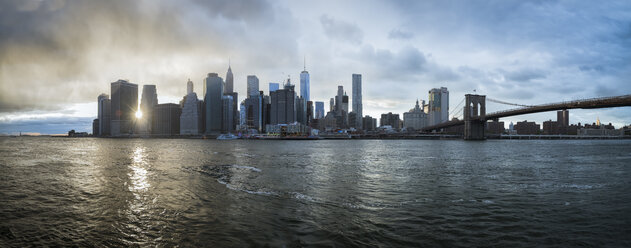 USA, New York City, skyline at sunset - STCF00260