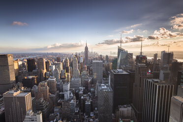 USA, New York City, Manhattan skyline at sunset - STCF00264