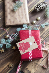 Christmas decoration and wrapped presents on wood - SARF02945