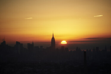 USA, New York State, New York City, Cityscape with Empire State building at sunrise - BCDF00201