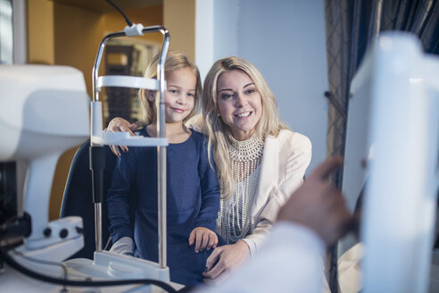 Mother and daughter at the optometrist - ZEF10556