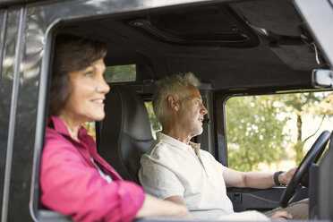 Senior couple on a trip in a cross country vehicle - ONF01017