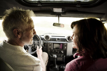 Senior couple on a trip in a cross country vehicle - ONF01056