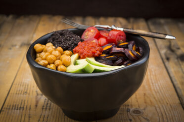 Buddha bowl of black amaranth, avocado, Purple Haze, roasted chickpeas, tomatoes and ajvar - LVF05392