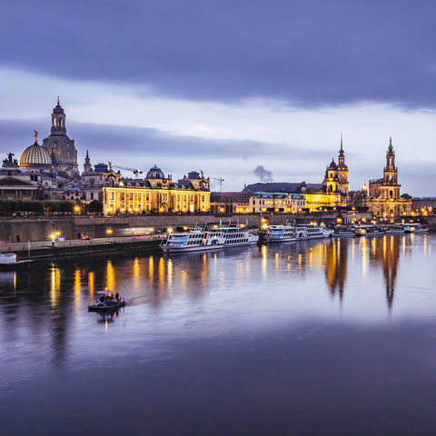 Germany, Saxony, Dresden, historic old town with Elbe River in the foreground in the evening stock photo