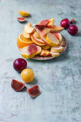 Plate with different fresh fruits - MYF01810