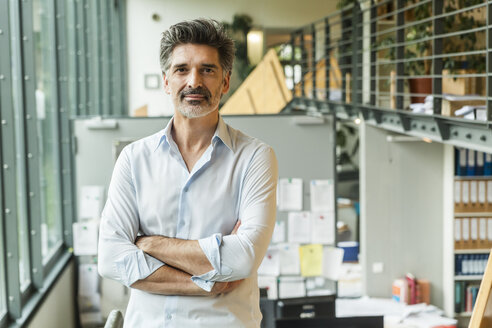 Successful architect standing in his office - TCF05147