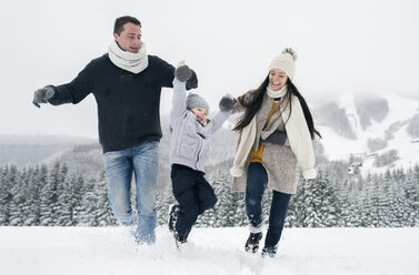 Happy family in winter landscape - HAPF00959