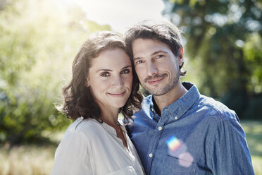 Portrait of smiling couple in park - RORF00312