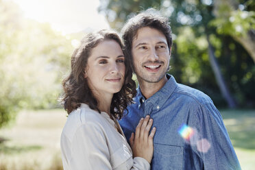 Portrait of smiling couple in park - RORF00315