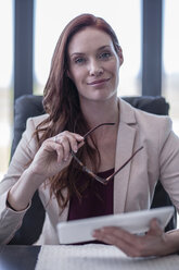 Successful businesswoman working in office - ZEF10955