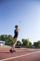 Female pole vaulter preparing - ABZF01388