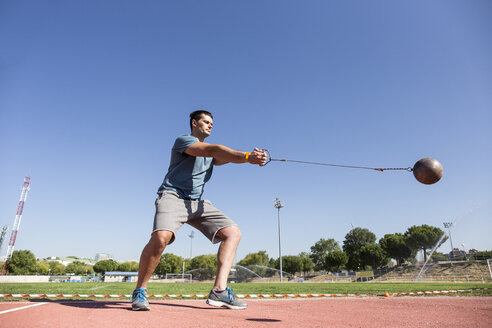 Athlete performing a hammer throw - ABZF01407