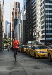 USA, New York City, man running in Manhattan - UUF08839
