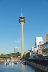 Germany, Dusseldorf, Gehry Buildings and television tower at Media Harbour - FRF00475