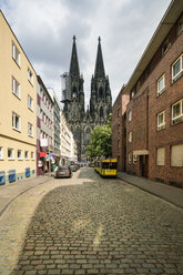 Germany, Cologne, view of street with Cologne Cathedral in the background - TAMF00720