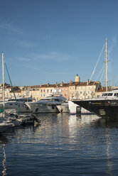 France, Saint-Tropez, marina and clock tower in background - DEGF00920