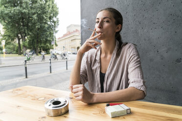 Young woman smoking - TAMF00734