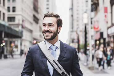 USA, New York City, smiling businessman in Manhattan - UUF08992