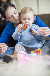 Mother and baby girl playing at home - ZEF11508