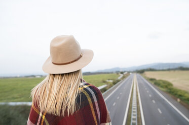 Woman looking at motorway - HAPF01108