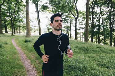 Man running on forest track - BOYF00630