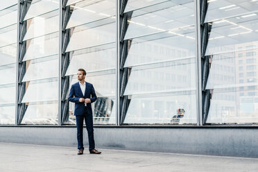 Germany, Berlin, businessman at Potsdamer Platz - KNSF00609