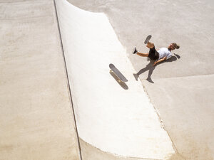 Young man skate boarding in skate park - LAF01810