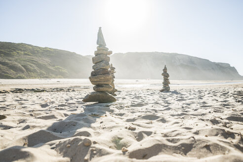 Portugal, Piled stones at the beach - CHPF00332