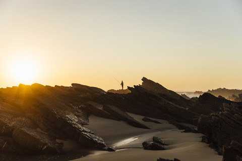 Portugal, Alentejo, Sunset at Zambujeira do Mar beach stock photo