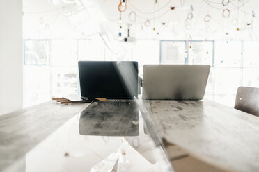 Two laptops on work desk - JOSF00403