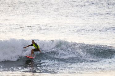 Boy surfing in the sea - SIPF01107