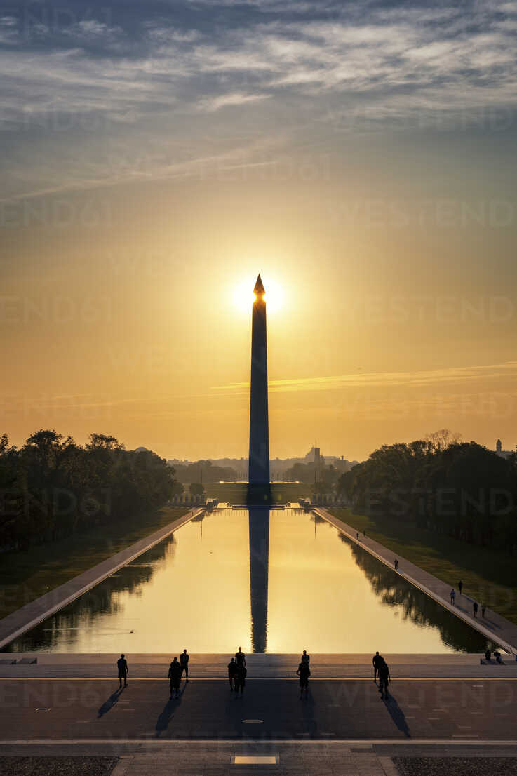 USA, Washington DC, view to Washington Monument at sunrise with soldiers  training in the foreground stock photo