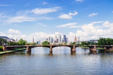 Germany, Frankfurt, view to skyline with Ignatz-Bubis-Bridge and Main River in the foreground - KRPF02043