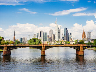 Germany, Frankfurt, view to skyline with Ignatz-Bubis-Bridge and Main River in the foreground - KRPF02044